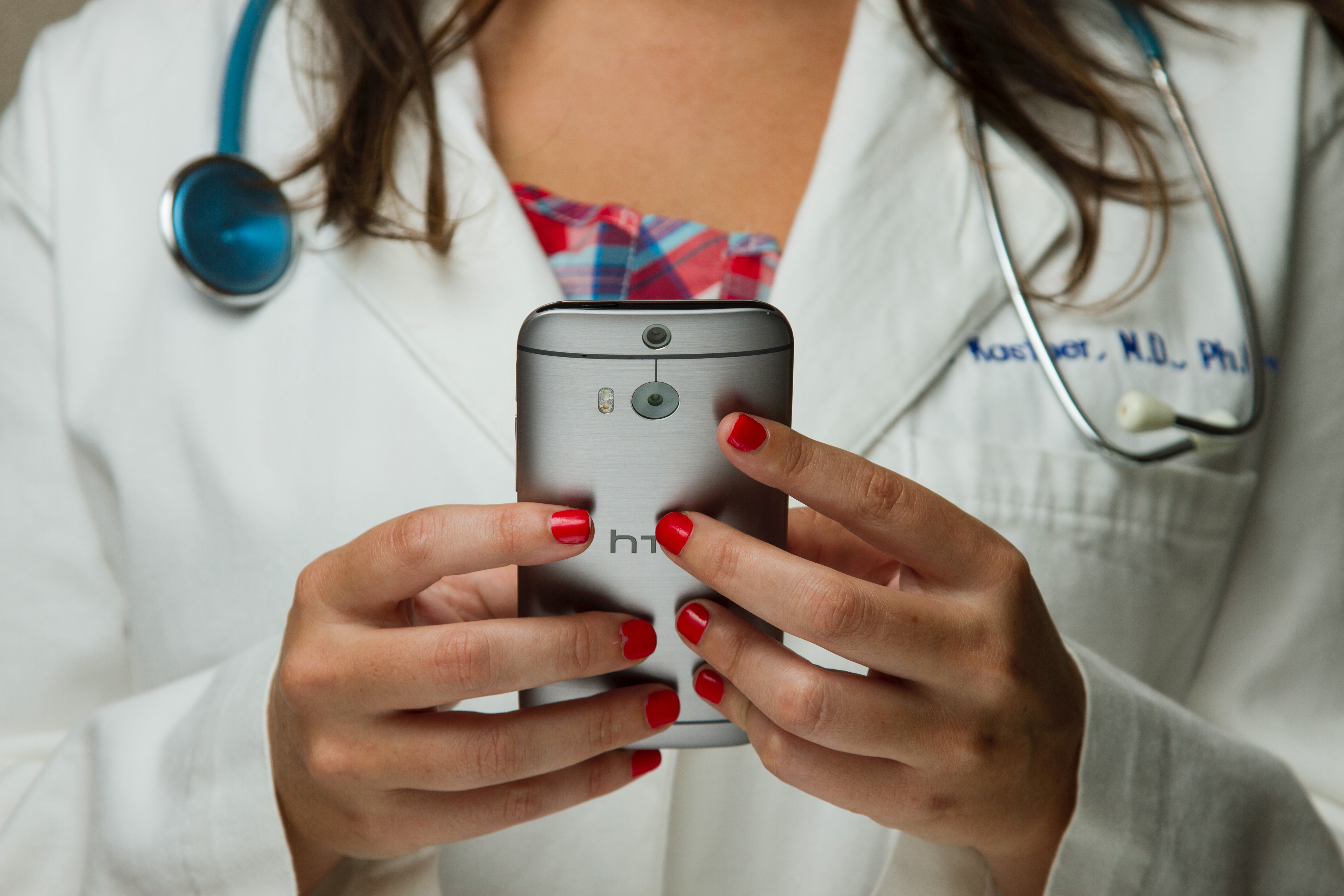 Doctor using a cell phone